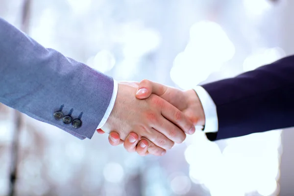 Businessmen shaking hands, isolated on white background — Stock Photo, Image