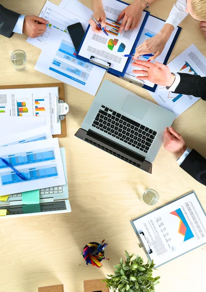 Business people sitting and discussing at business meeting, in office — Stock Photo, Image