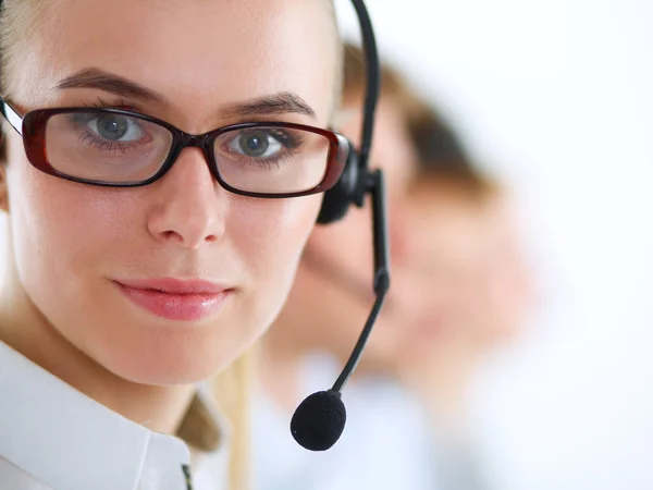 Attractive positive young businesspeople and colleagues in a call center office — Stock Photo, Image