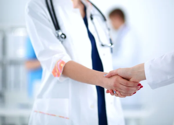 Young medical people handshaking at office — Stock Photo, Image