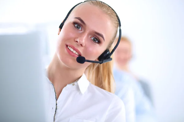 Attractive positive young businesspeople and colleagues in a call center office — Stock Photo, Image