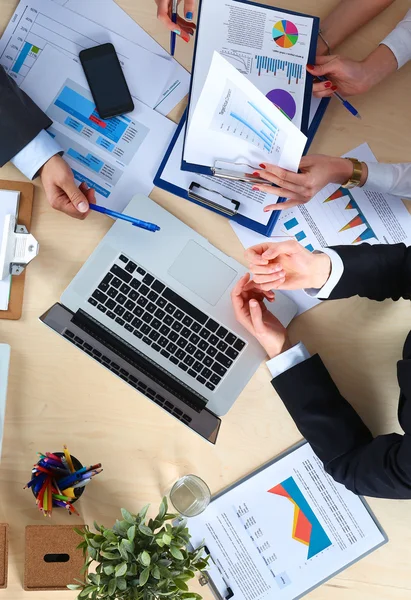 Business people sitting and discussing at business meeting, in office — Stock Photo, Image