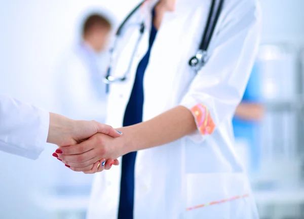 Young medical people handshaking at office — Stock Photo, Image