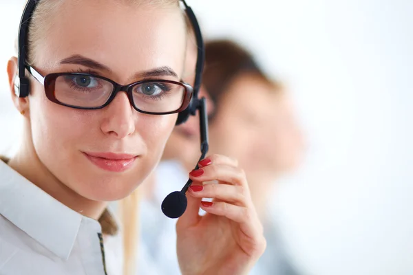 Attractive positive young businesspeople and colleagues in a call center office — Stock Photo, Image