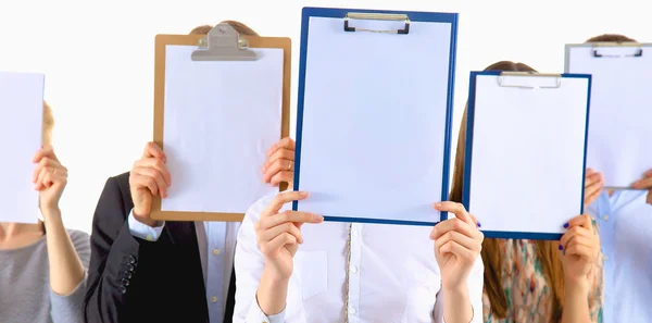 Team of businesspeople holding a folders near face isolated on white background — Stock Photo, Image