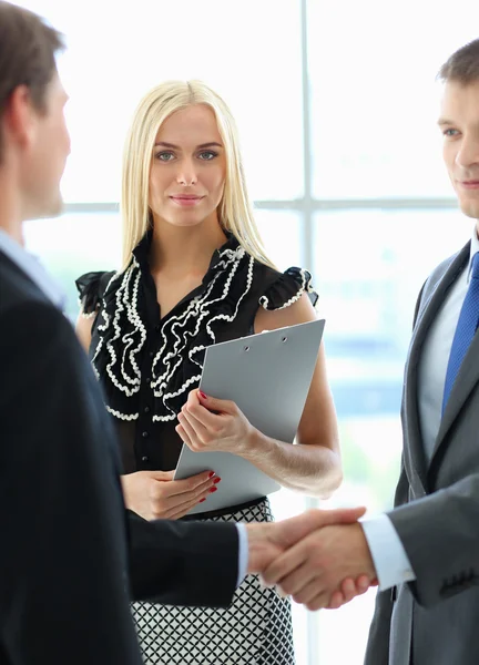 Business people shaking hands after meeting — Stock Photo, Image