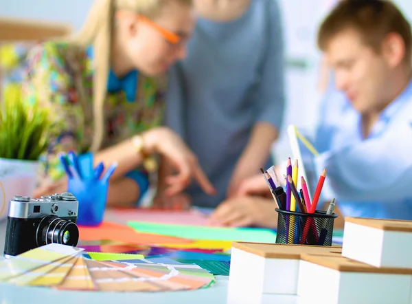 Young business people working at office on new project. — Stock Photo, Image