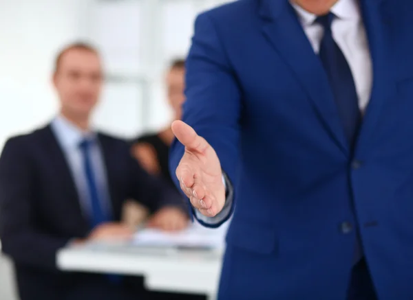 Close-up of a businessman offering a handshake — Stock Photo, Image