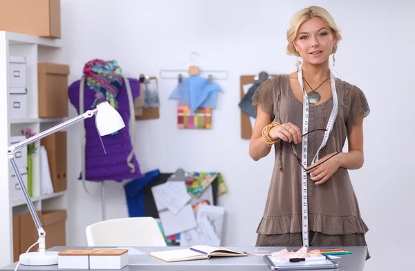 Clothes designer at work in her office — Stock Photo, Image