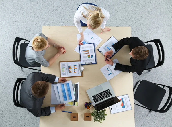 Top view of office workers sitting at a table for meetin — Stock Photo, Image