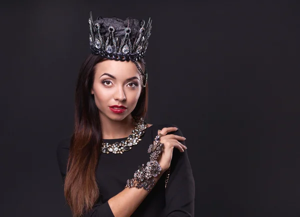 Portrait of woman in black crown — Stock Photo, Image