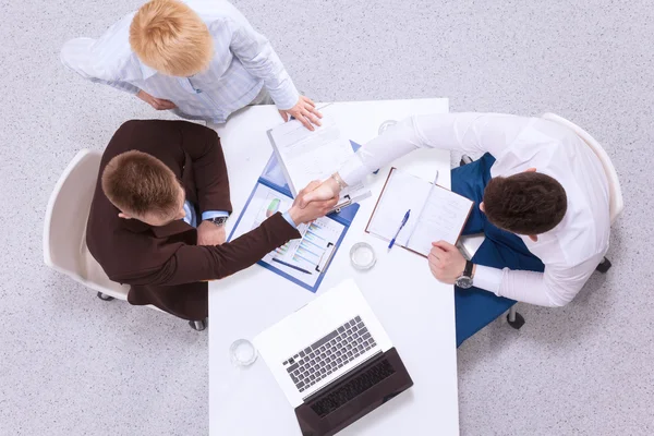 Business people handshake, sitting at the table — Stock Photo, Image