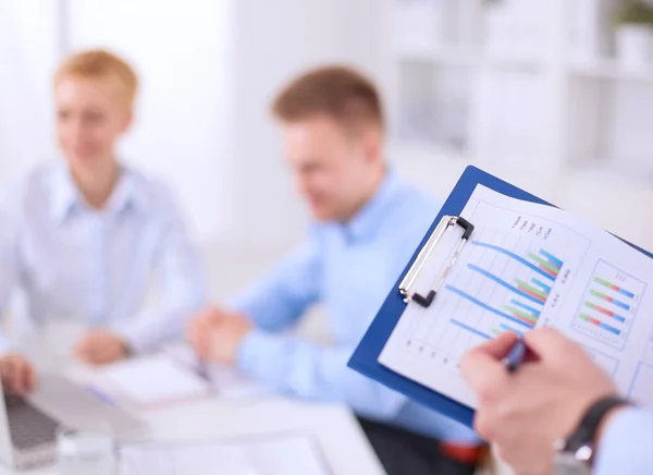 Business people sitting and discussing at business meeting, in office — Stock Photo, Image