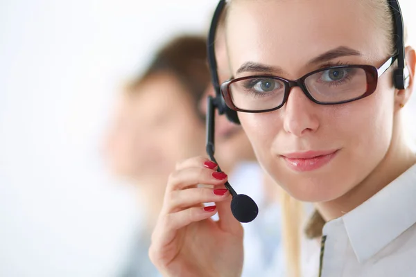 Attractive positive young businesspeople and colleagues in a call center office — Stock Photo, Image