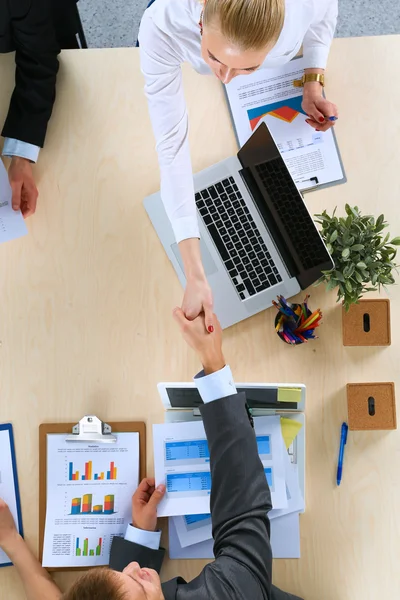 Business people handshake, sitting at the table — Stock Photo, Image