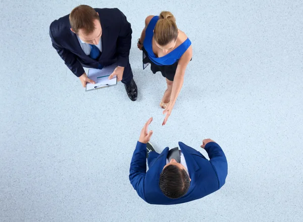 Empresários apertando as mãos - topview — Fotografia de Stock