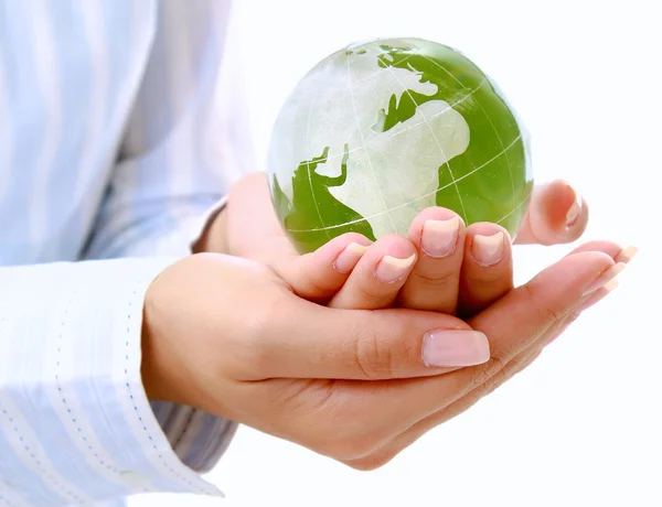 Hands holding a green earth, isolated on white background — Stock Photo, Image