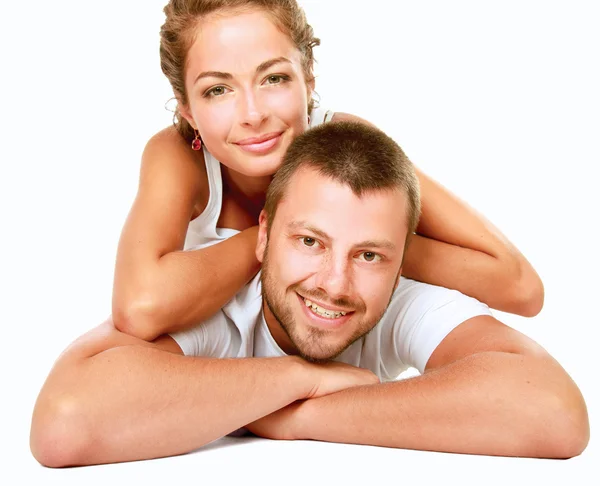 Ung man och kvinna tillsammans över vit bakgrund — Stockfoto