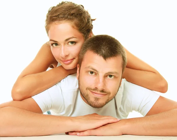 Joven hombre y mujer juntos sobre fondo blanco — Foto de Stock