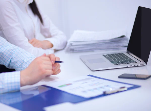 Business people sitting and discussing at business meeting, in office — Stock Photo, Image