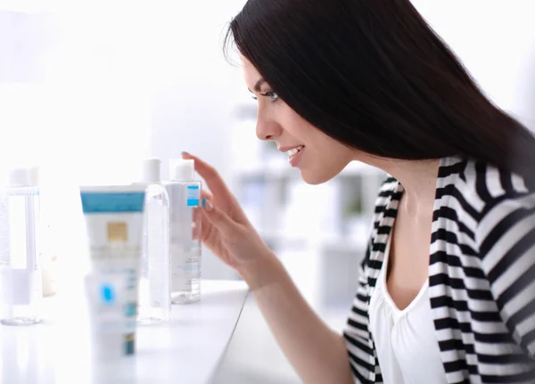 Beautiful young woman in shop — Stock Photo, Image