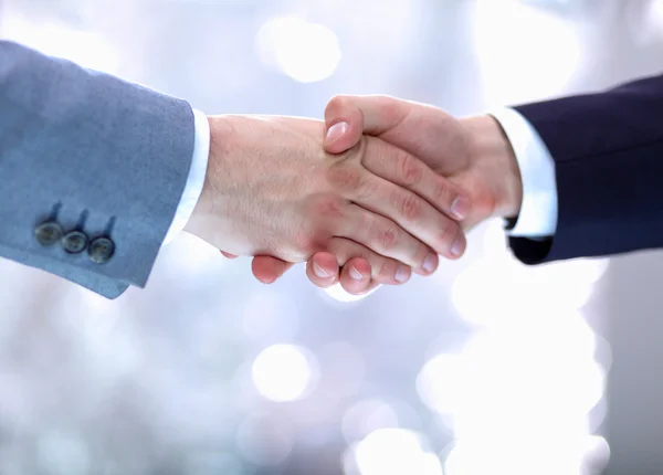 Businessmen shaking hands, isolated on white background — Stock Photo, Image