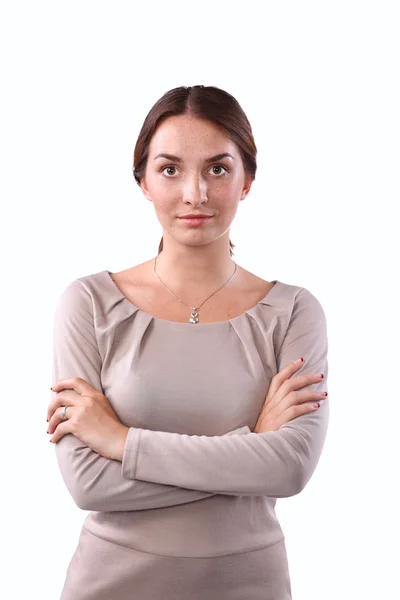 Mujer joven de pie, aislada sobre fondo blanco — Foto de Stock