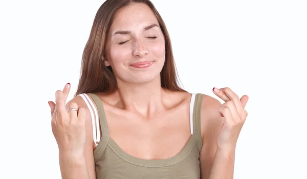 Portrait of a smiling young woman standing — Stock Photo, Image