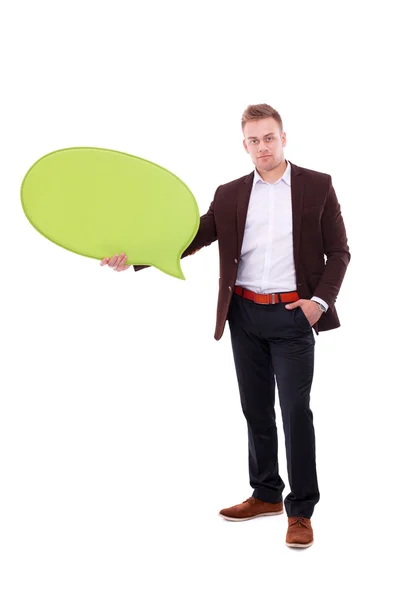 Человек держит белый пустой пузырь речи с пространством для текста — стоковое фото