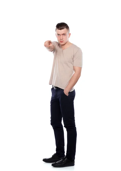 Portrait of a confident man standing over white background — Stock Photo, Image