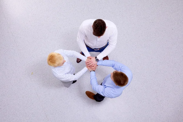 Empresários apertando as mãos - topview — Fotografia de Stock