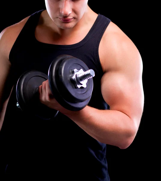 Hombre musculoso guapo haciendo ejercicio con pesas — Foto de Stock