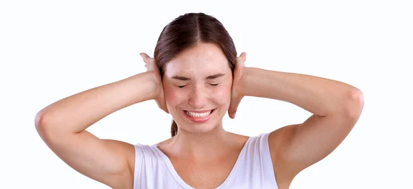 Portrait of woman with hands on ears — Stock Photo, Image