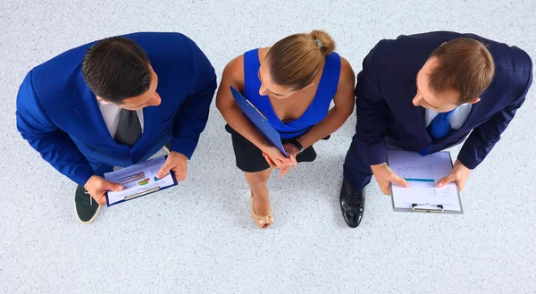 Mensen uit het bedrijfsleven permanent samen - topview — Stockfoto