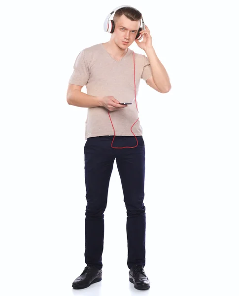 Portrait of a confident man standing over white background — Stock Photo, Image