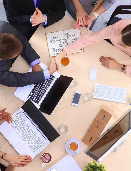 Business people sitting and discussing at business meeting, in office — Stock Photo, Image