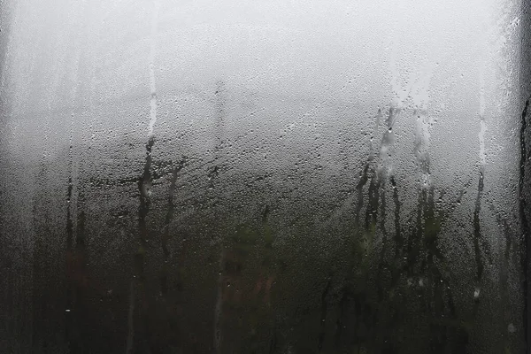 Rain droplets on the window glass