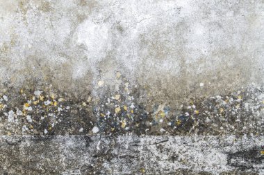 Etek tahtası, grunge arkaplanı veya dokusu olan eski yıpranmış beton duvar 