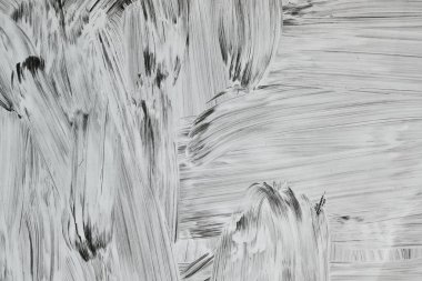 Bir dükkan penceresinde beyaz boya darbeleri, soyut arkaplan veya doku