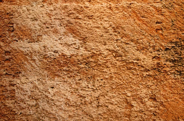 ラフで多孔質の砂岩の壁の質感の詳細 — ストック写真