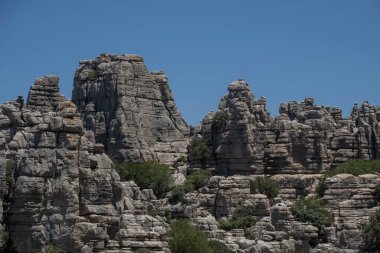 Torcal de Antequera Doğal Parkı, Malaga, Endülüs, İspanya 'da karst oluşumlarıyla engebeli kireçtaşı manzarası