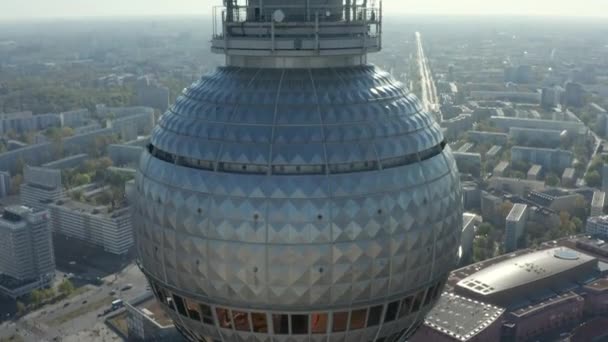 AERIAL: Super Close Up view of the top of Alexander Tower in Berlin, Germany on the hot summer day in 2020 — стоковое видео