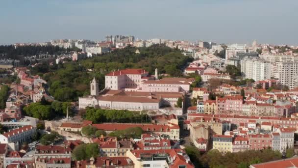 Aerial footage of town buildings variety. Camera flying along Necessidades Palace. Lisbon, capital of Portugal. — Stock Video