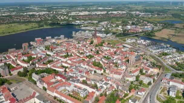 Aerial panoramic view of old town. Historic landmarks from above. City in flat coastal landscape — Stock Video