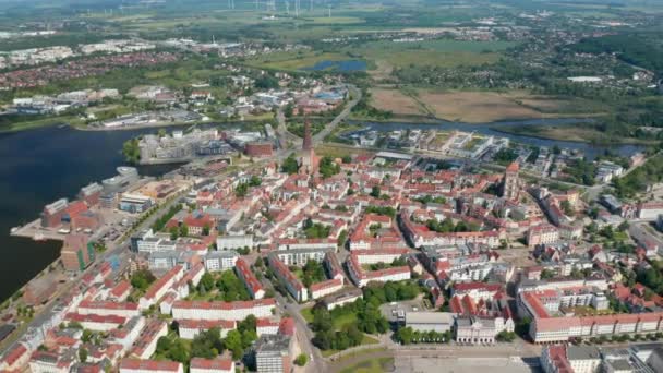 Aerial panoramic view of historic town centre surrounded with Warnow river — Stock Video