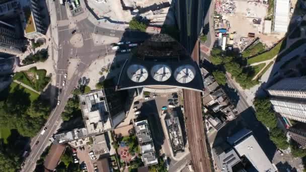 Aerial birds eye overhead top down ascending view of Strata apartment building at Elephant and Castle. Modern design skyscraper using renewable energy resources. London, UK — Stock Video