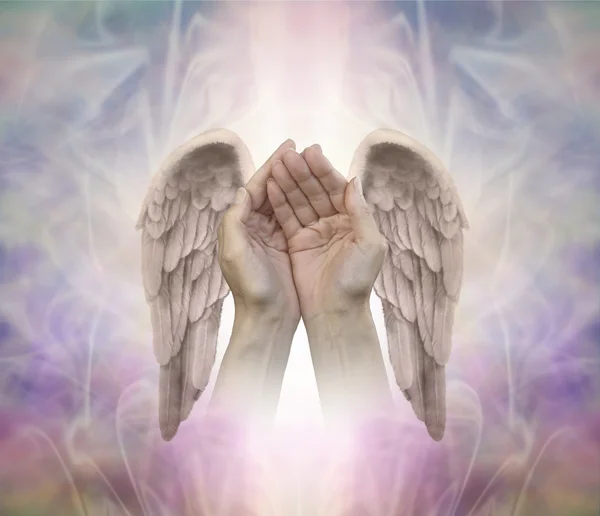 Angelic helping hands helping hands — Stockfoto