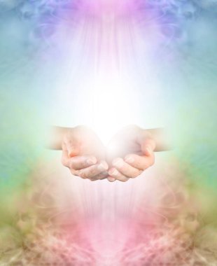 Ask Believe Receive in the healing Power of Loving Kindness - female  cupped hands emerging from multicoloured ethereal background with copy space above and below                               clipart