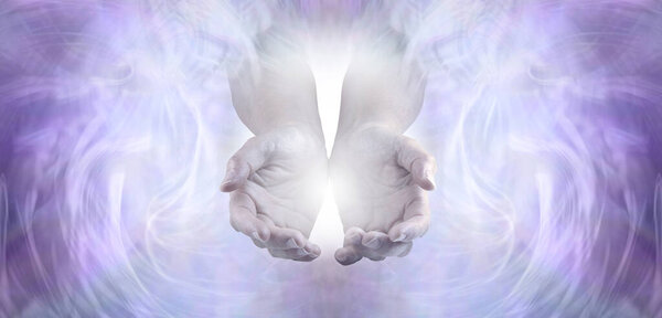 Sending you pure unconditional love and spiritual healing energy - female cupped hands emerging from an angelic pale lilac ethereal energy background