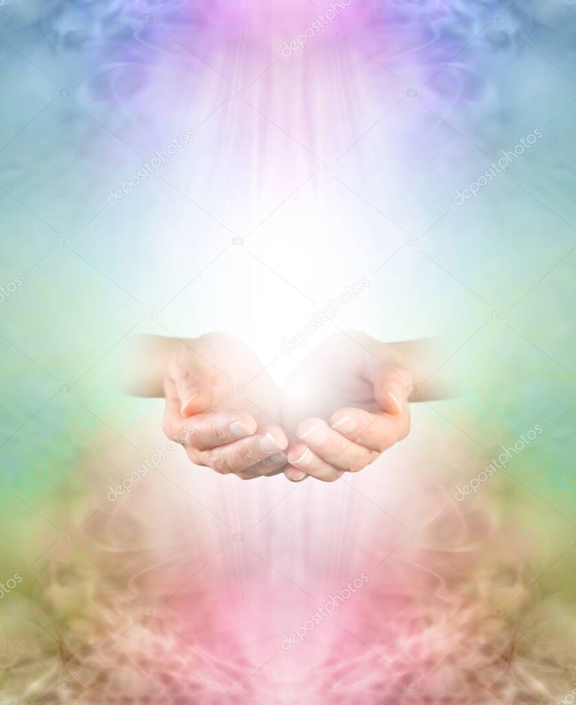 Ask Believe Receive in the healing Power of Loving Kindness - female  cupped hands emerging from multicoloured ethereal background with copy space above and below                              